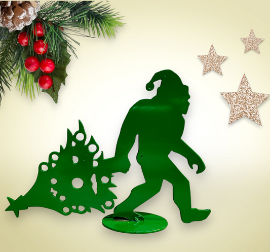 metal bigfoot dragging a tree